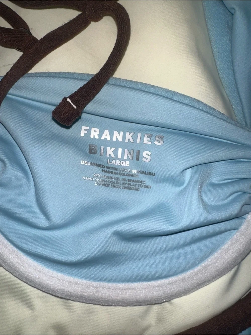 Frankie’s Bikini’s blue large top & medium brown bottoms